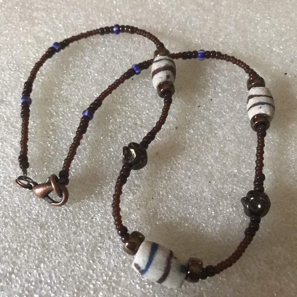 Handcrafted Brown Beaded Necklace with White and Blue Accent Beads